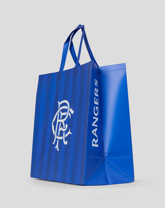 Blue Rangers tote bag shown from the side with double handles and visible vertical branding.