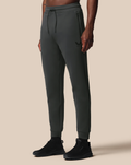 Full length view of gray Flex Jogger with drawstring waist, zip pocket, and cuffed ankles