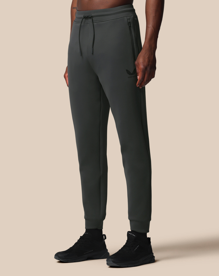 Full length view of gray Flex Jogger with drawstring waist, zip pocket, and cuffed ankles