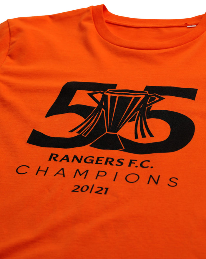 Close up of orange Champions T shirt showing bold black 55 trophy graphic and text