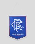 Blue Ibrox Stadium banner with white intertwined initials and EST 1872 hung from a white cord
