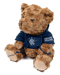 Brown teddy bear in a navy Rangers hoodie with a crest on the chest and Follow Follow on the sleeve